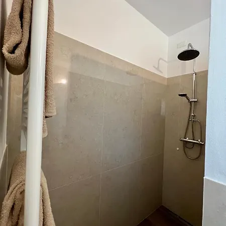 Paola Suites & *